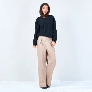 Textured cable knit sweater with floral detail wholesale